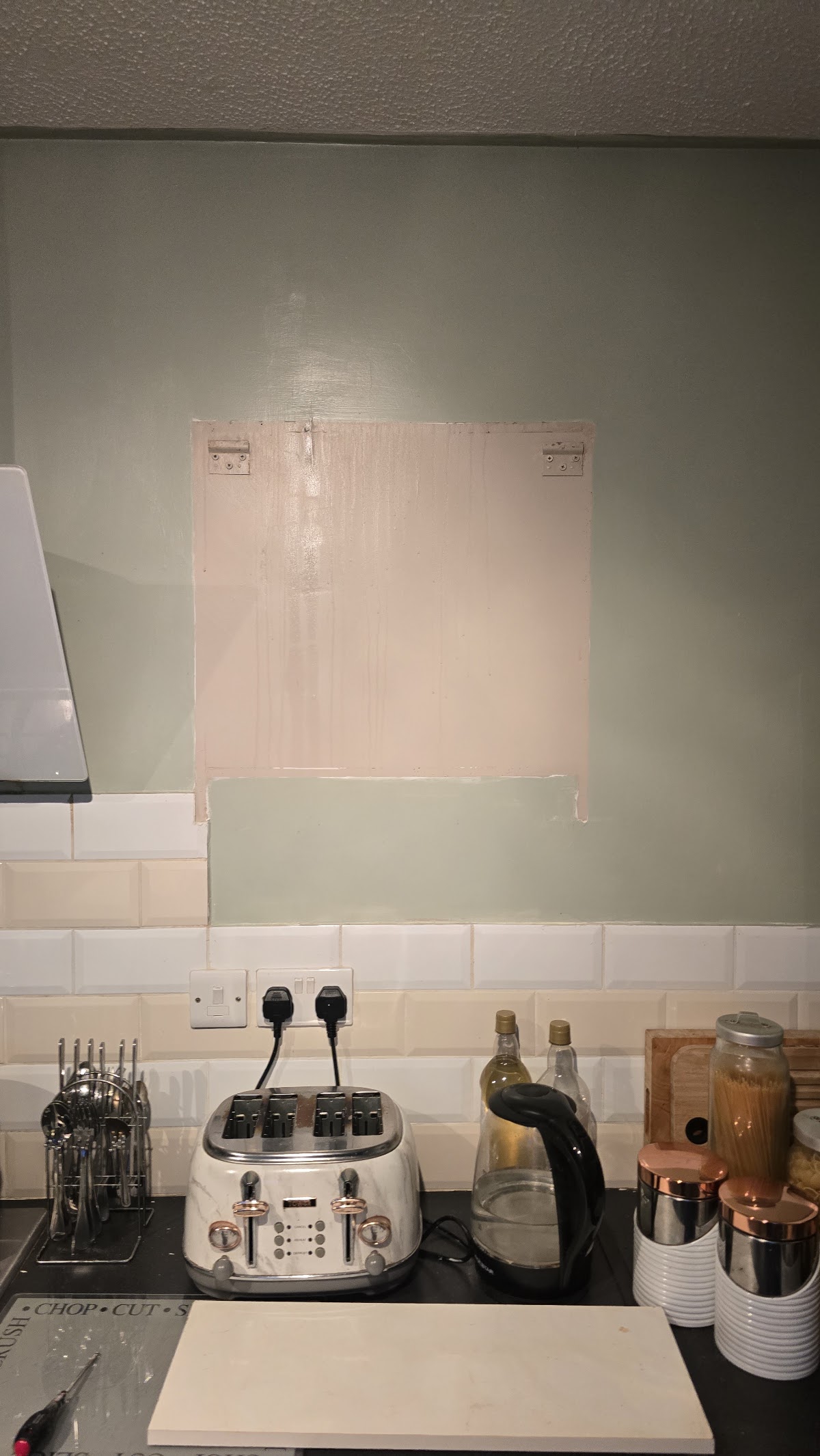 Kitchen wall prepped and metro tiled